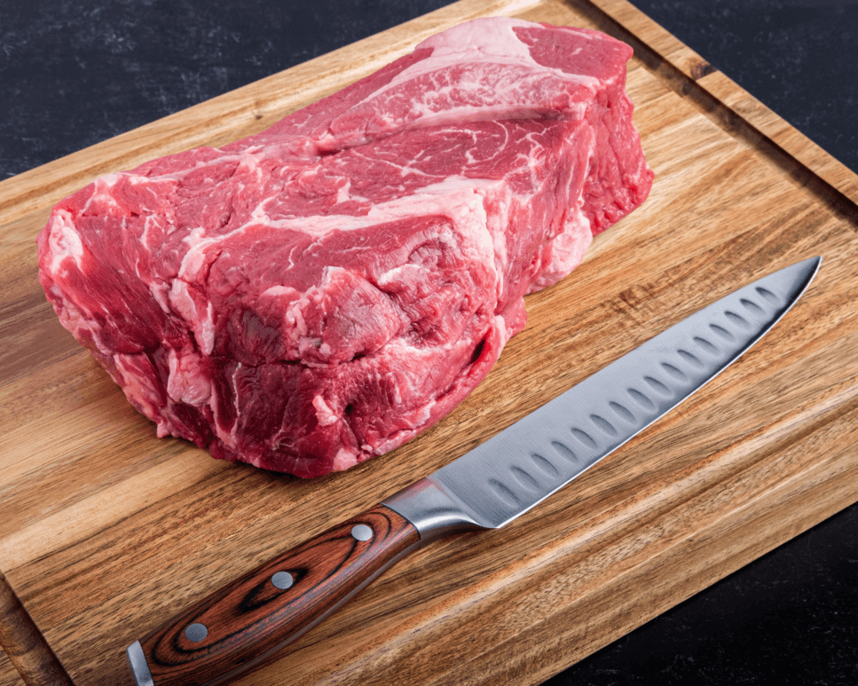 steak on cutting board with knife